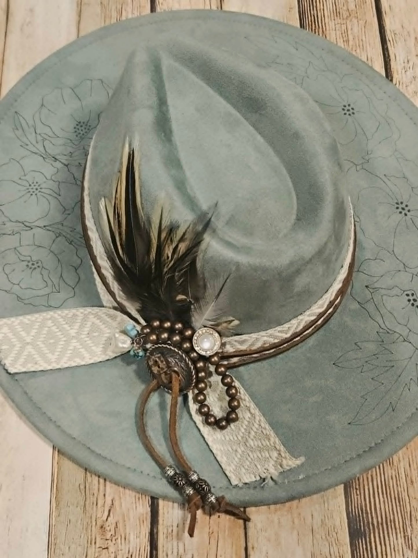 laser poppy flower large brim hat, feather hat, teal large brim hat, bead and feather embellished hat, cowboy hat, laser floral design cowboy hat,