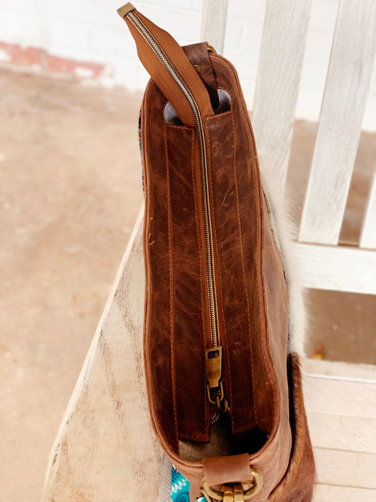 Mahala’s Heritage Brown-White Cowhide Convertible Crossbody
