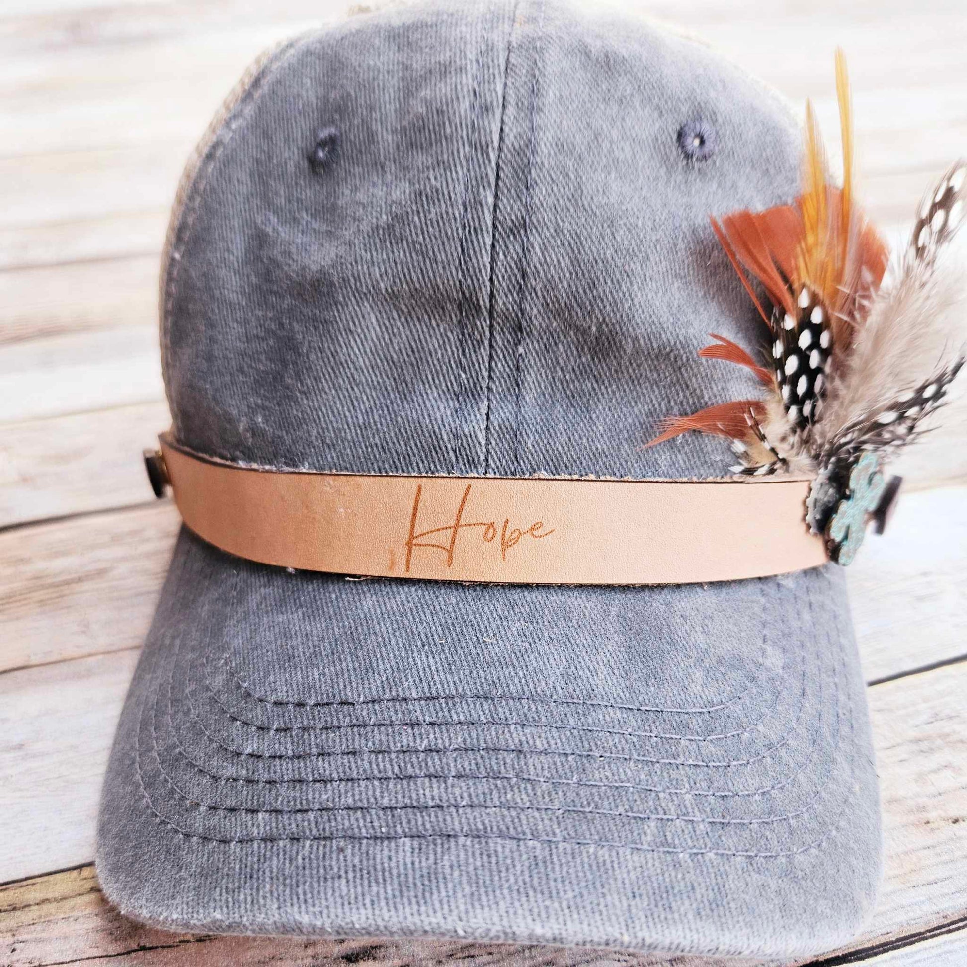 hope burned leather trucker hat, feathered hat, light denim hat