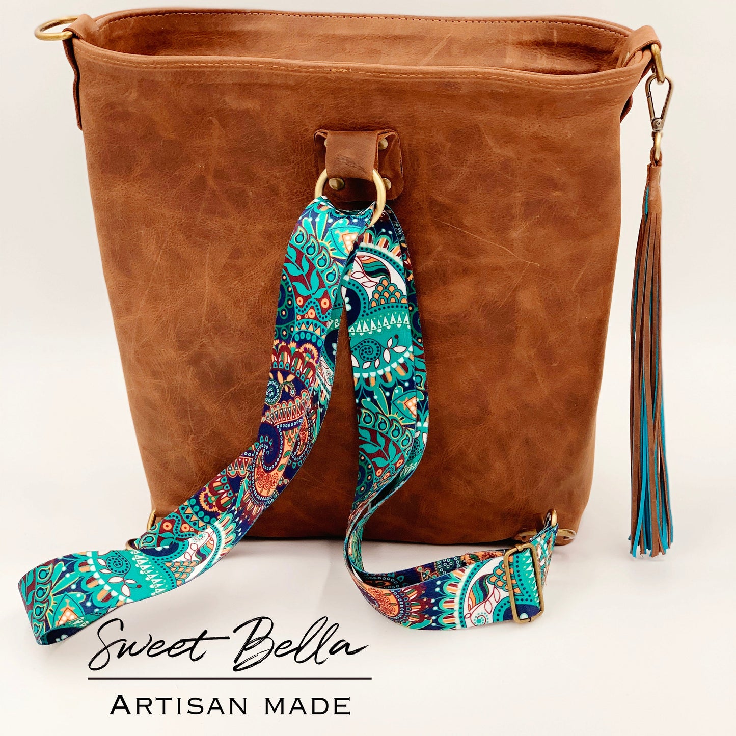 Mahala’s Heritage Brown-White Cowhide Convertible Crossbody
