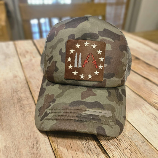 Embroidered Leather Gun Patch Trucker Hat