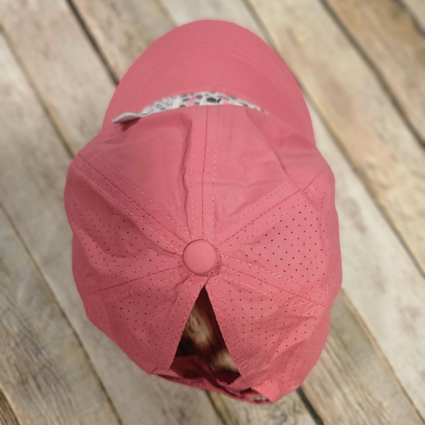 coral crisscross cap with black and white leopard leather "God is Good" patch