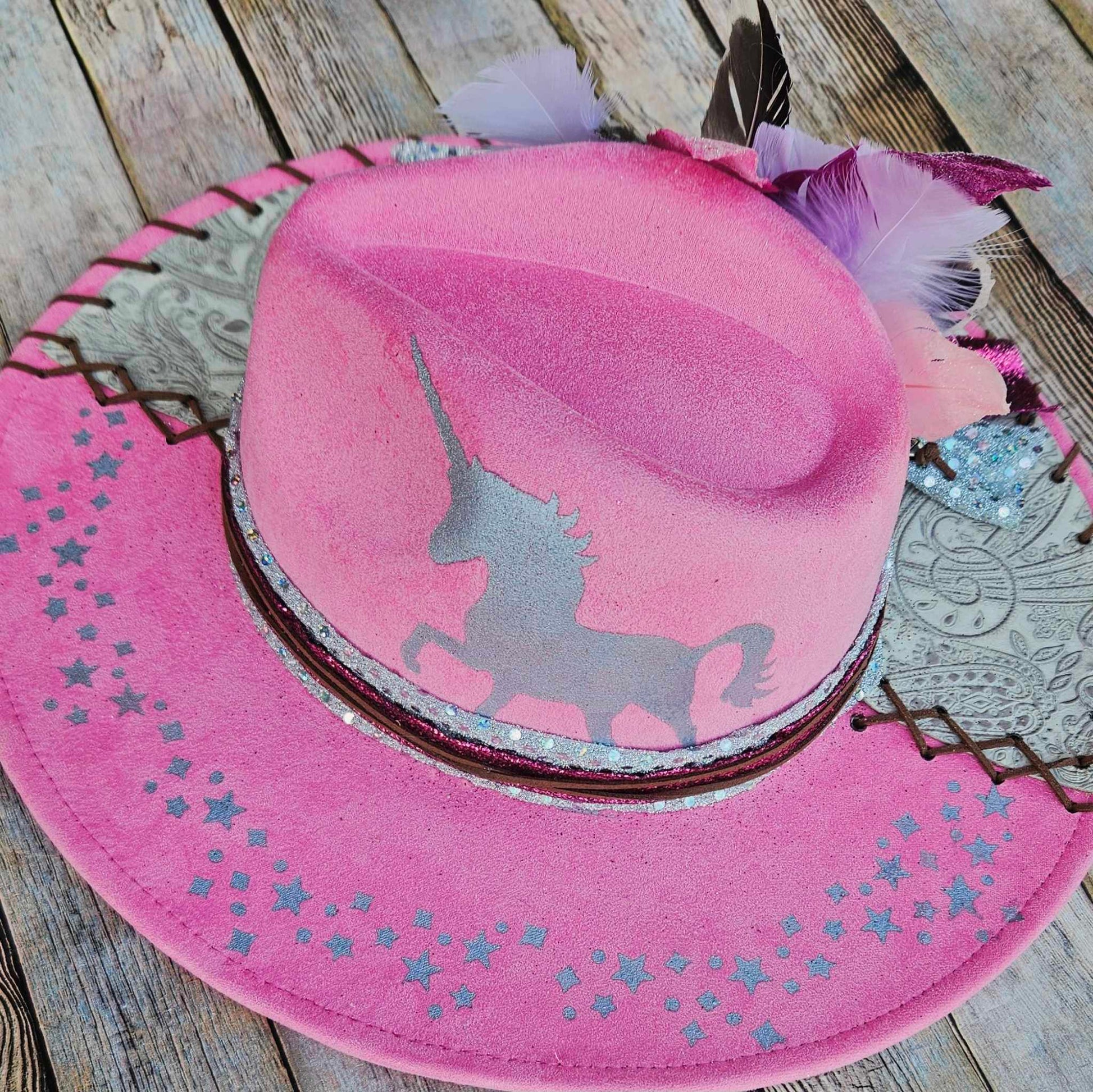 pink felt wide brim hat, unicorn painted hat, wide brim feathered hat, leather laced hat, hand crafted wide brim hat. adjustable pink hat