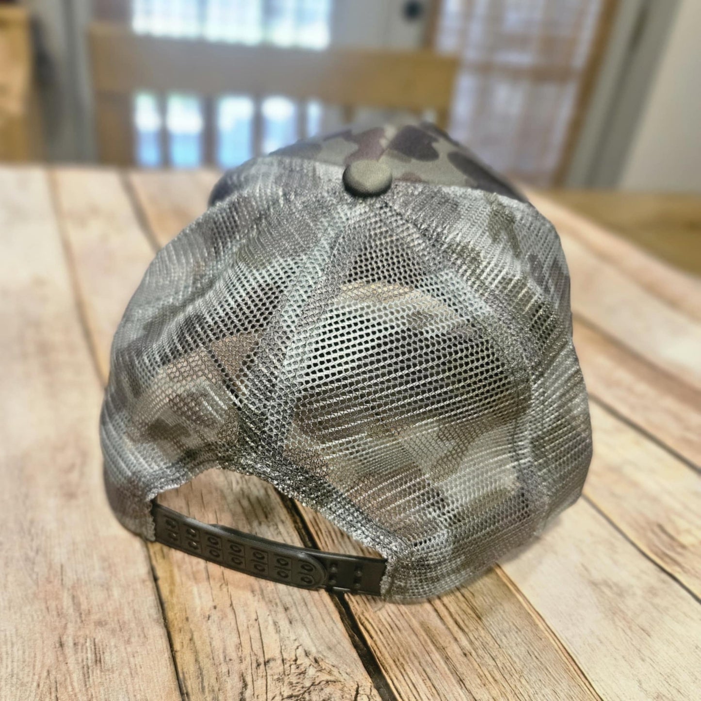 Embroidered Leather Gun Patch Trucker Hat