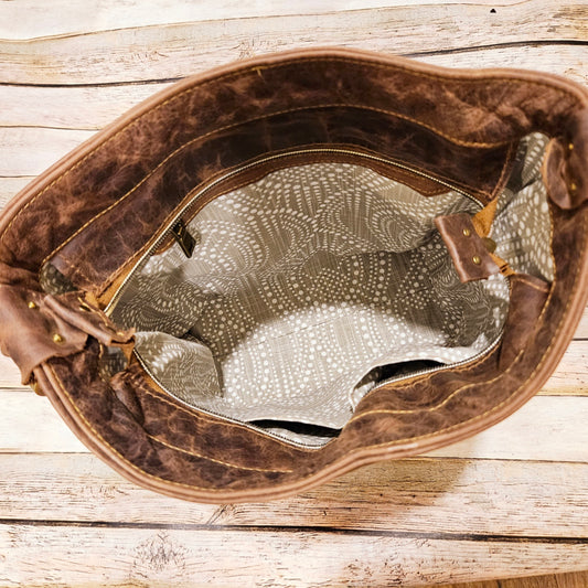 Mahala’s Heritage Brown-White Cowhide Convertible Crossbody