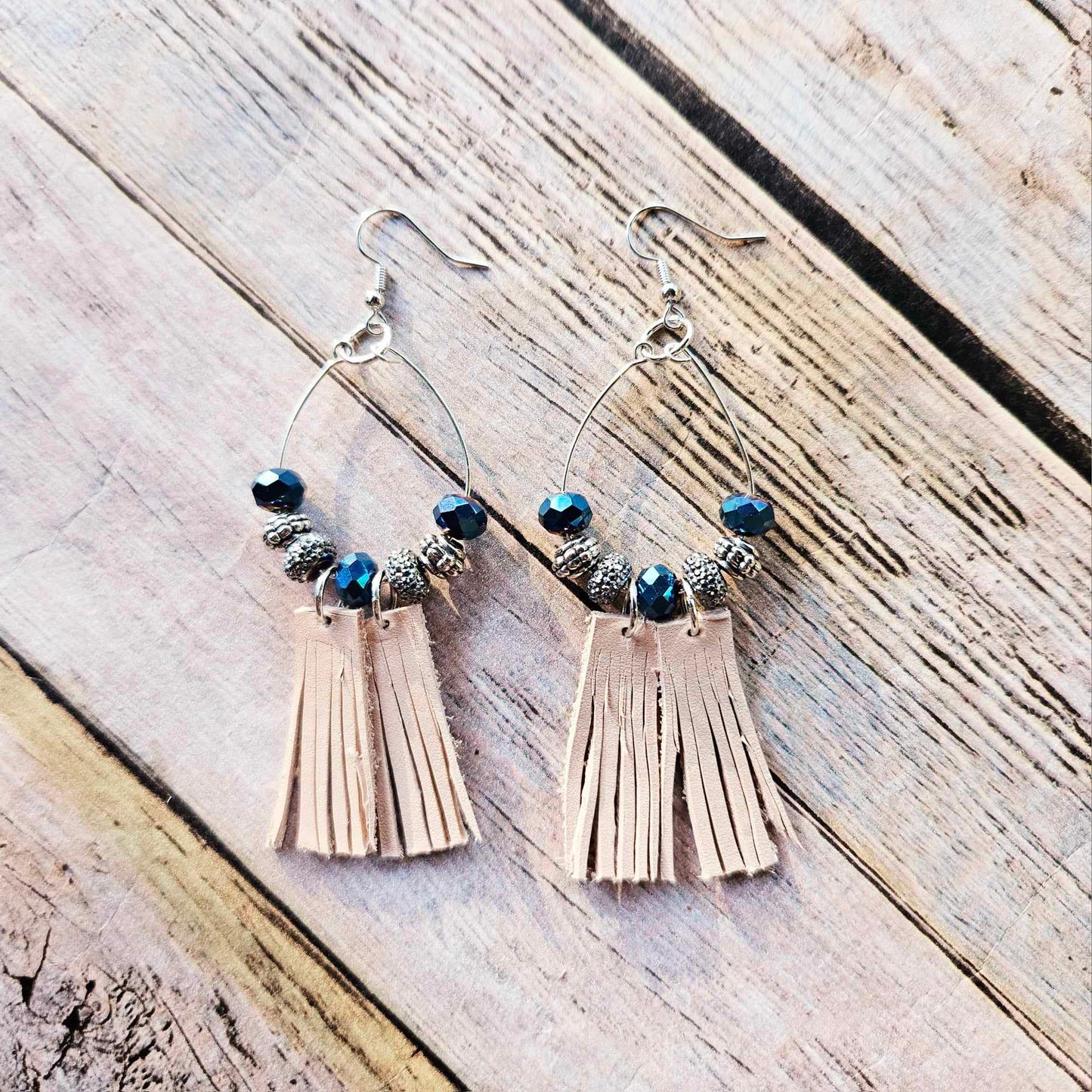 silver hoop earrings, blue crystal beads veg tan leather tassels, handmade leather jewelry