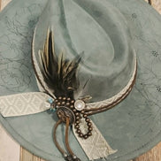 laser poppy flower large brim hat, feather hat, teal large brim hat, bead and feather embellished hat, cowboy hat, laser floral design cowboy hat,  