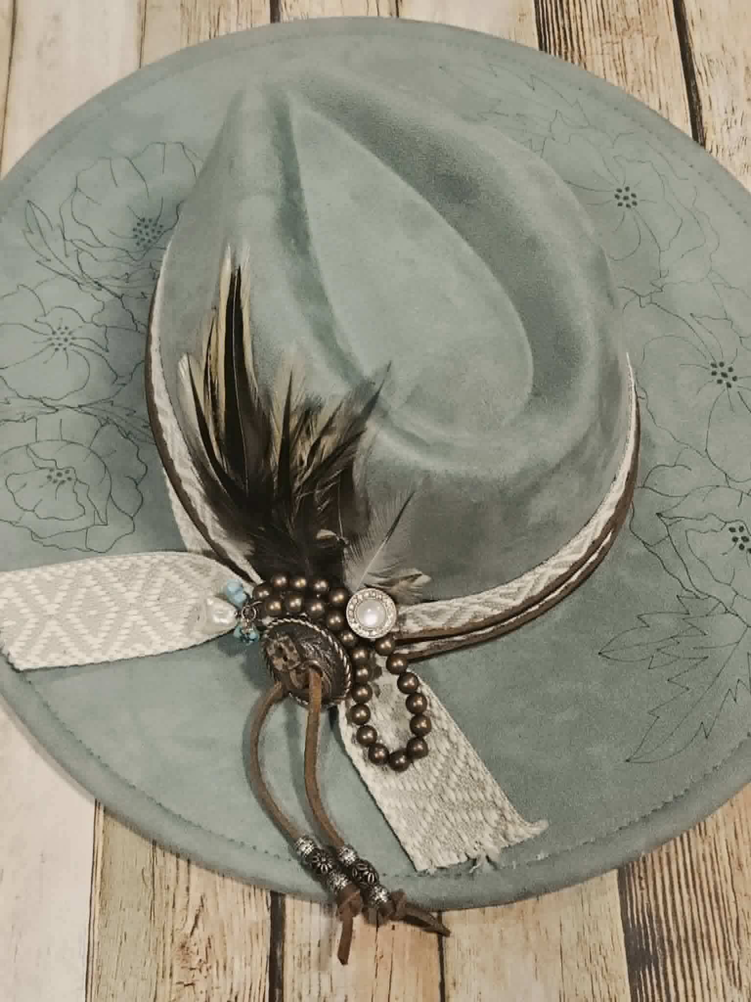 laser poppy flower large brim hat, feather hat, teal large brim hat, bead and feather embellished hat, cowboy hat, laser floral design cowboy hat,  