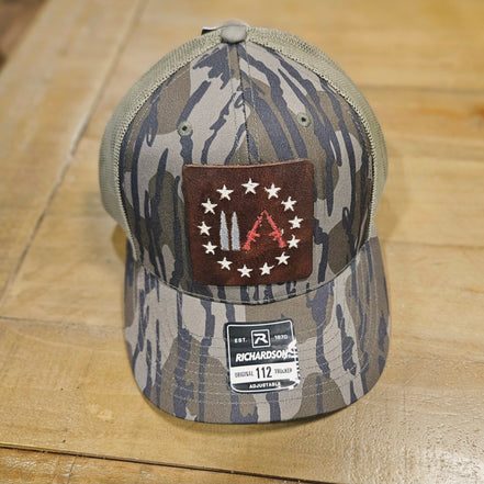 Embroidered Leather Gun Patch Trucker Hat