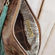wristlet with leather fringe, leather wristlet, leather fringe wristlet, fringe wristlet, brown and turquoise leather wristlet