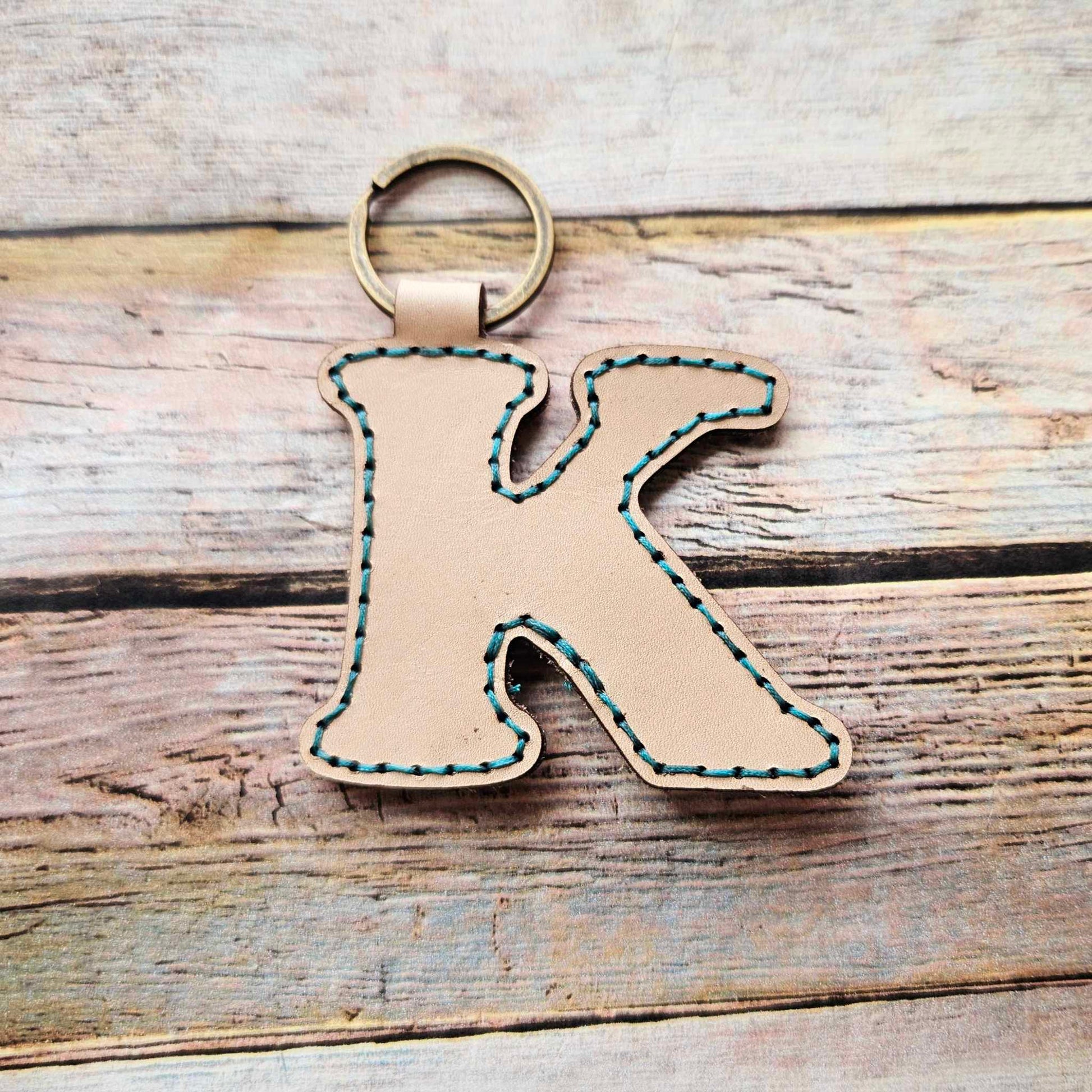 Laser burn, letter keychain, leather keychain, leather,