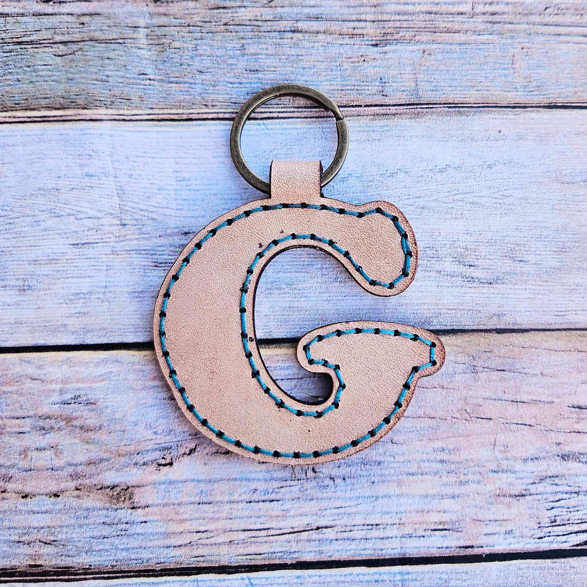 Laser burn, letter keychain, leather keychain, leather,