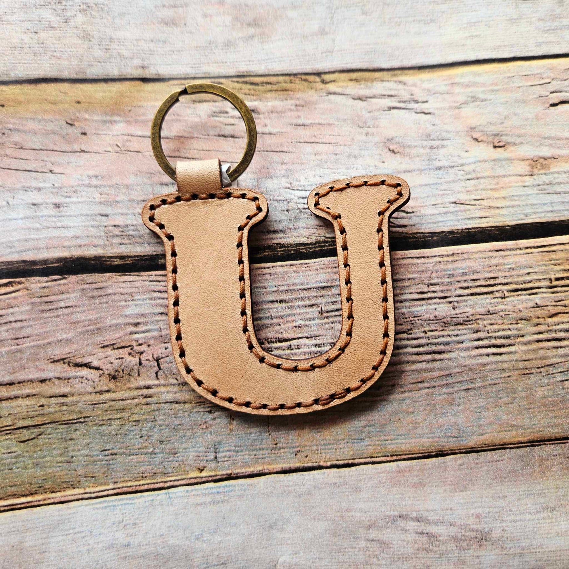 Laser burn, letter keychain, leather keychain, leather,