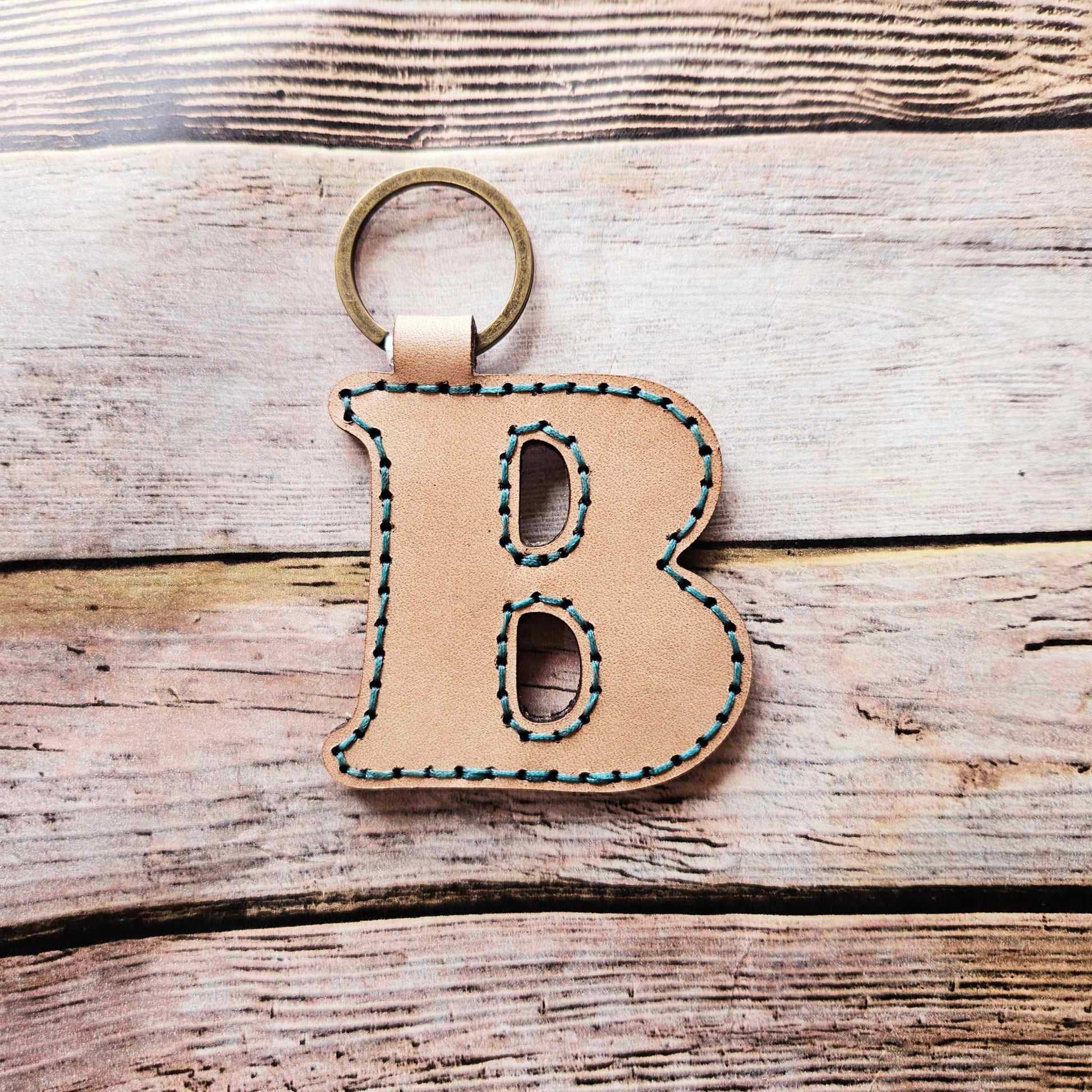 Laser burn, letter keychain, leather keychain, leather,