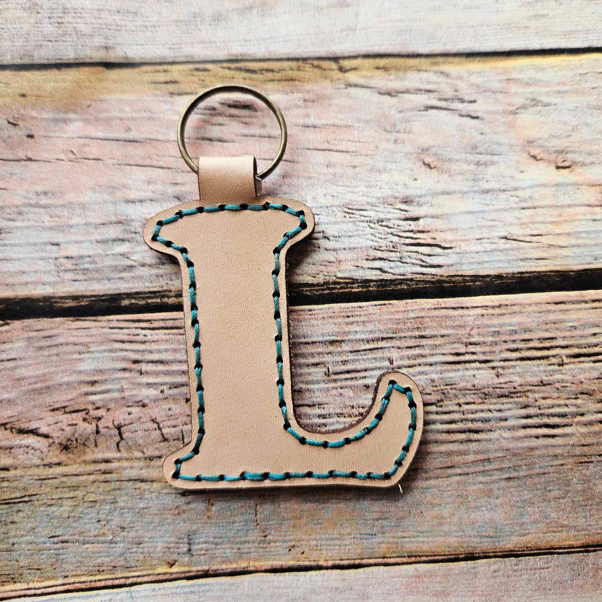 Laser burn, letter keychain, leather keychain, leather,