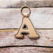 Laser burn, letter keychain, leather keychain, leather,