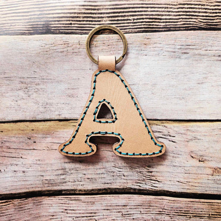 Laser burn, letter keychain, leather keychain, leather,