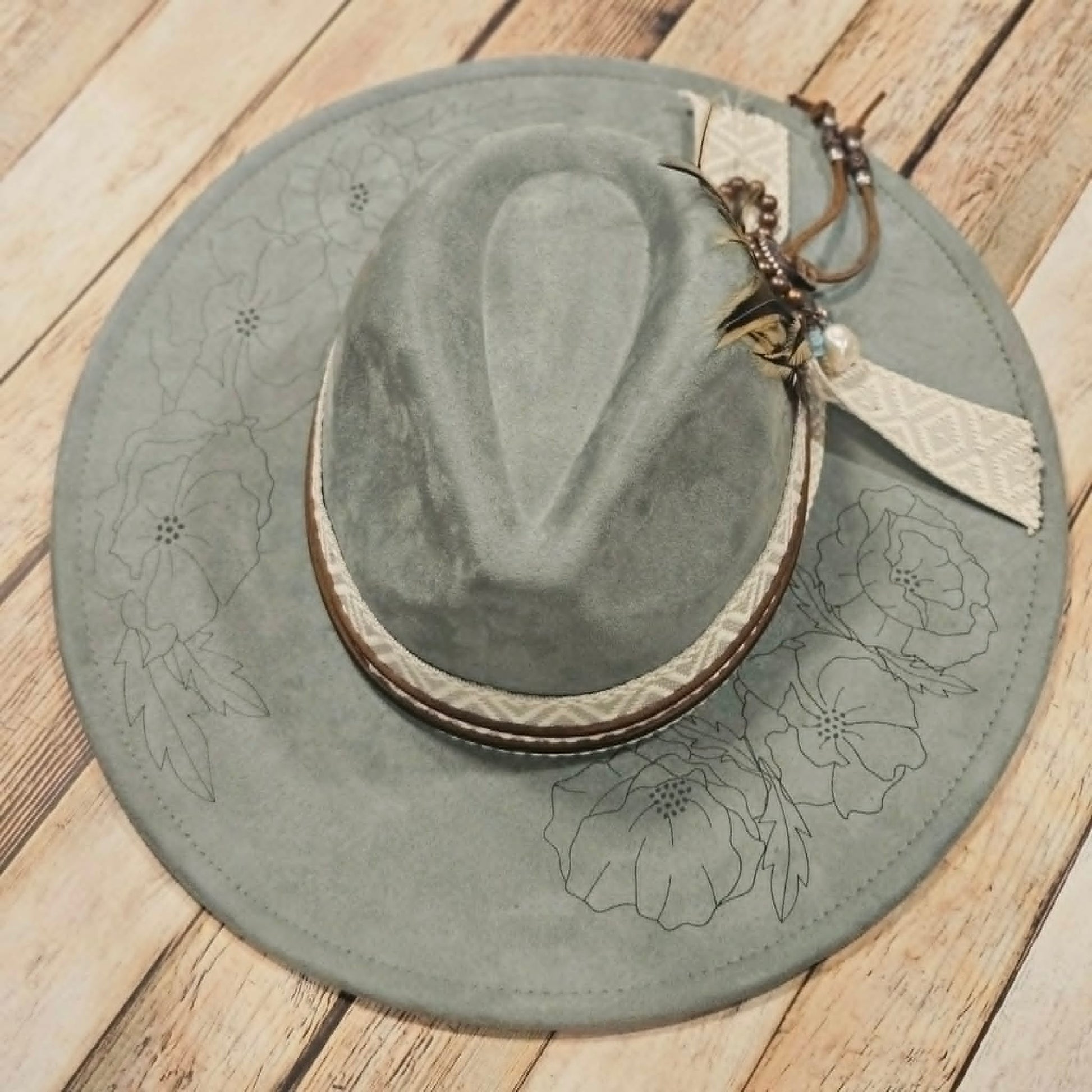laser poppy flower large brim hat, feather hat, teal large brim hat, bead and feather embellished hat, cowboy hat, laser floral design cowboy hat,  
