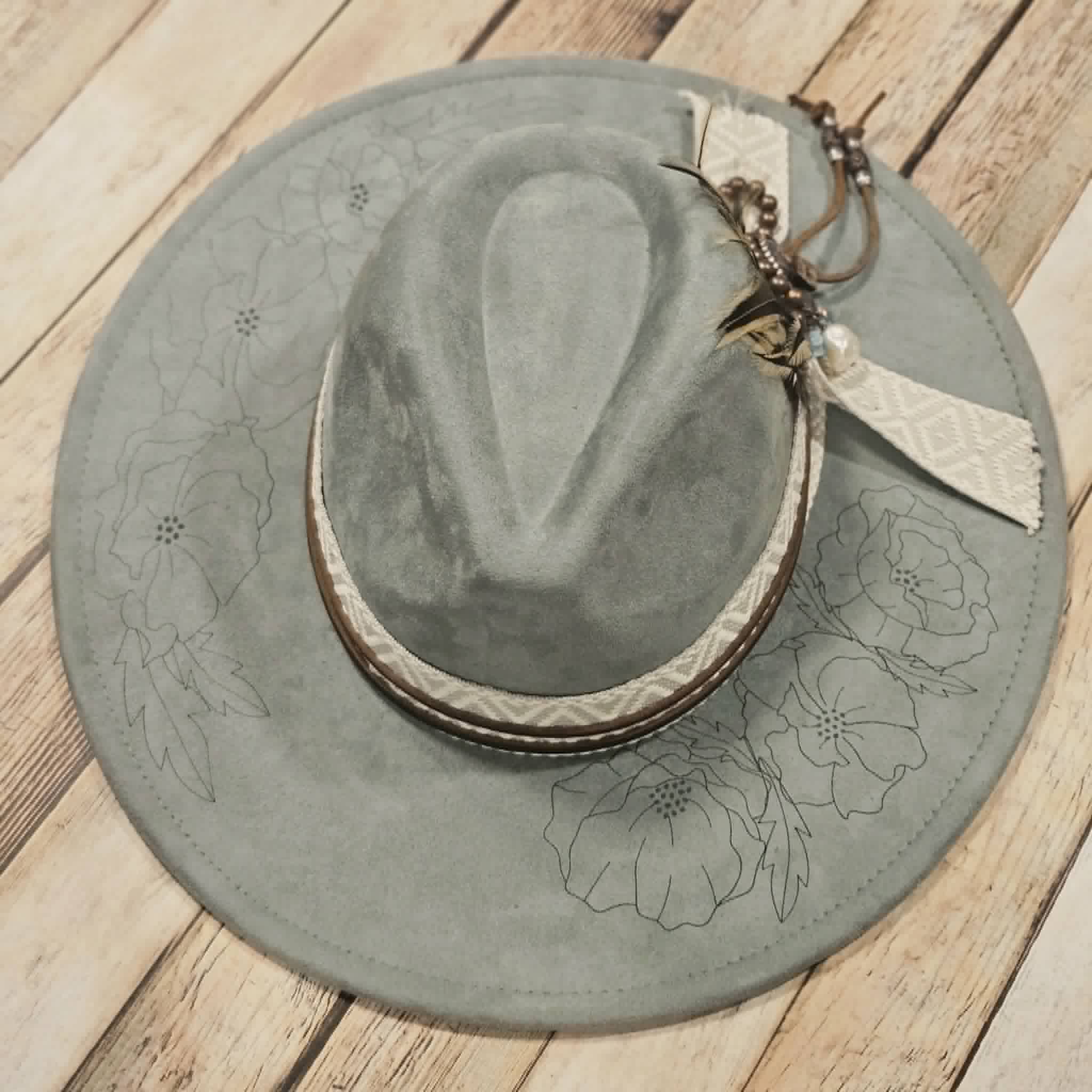 laser poppy flower large brim hat, feather hat, teal large brim hat, bead and feather embellished hat, cowboy hat, laser floral design cowboy hat,  