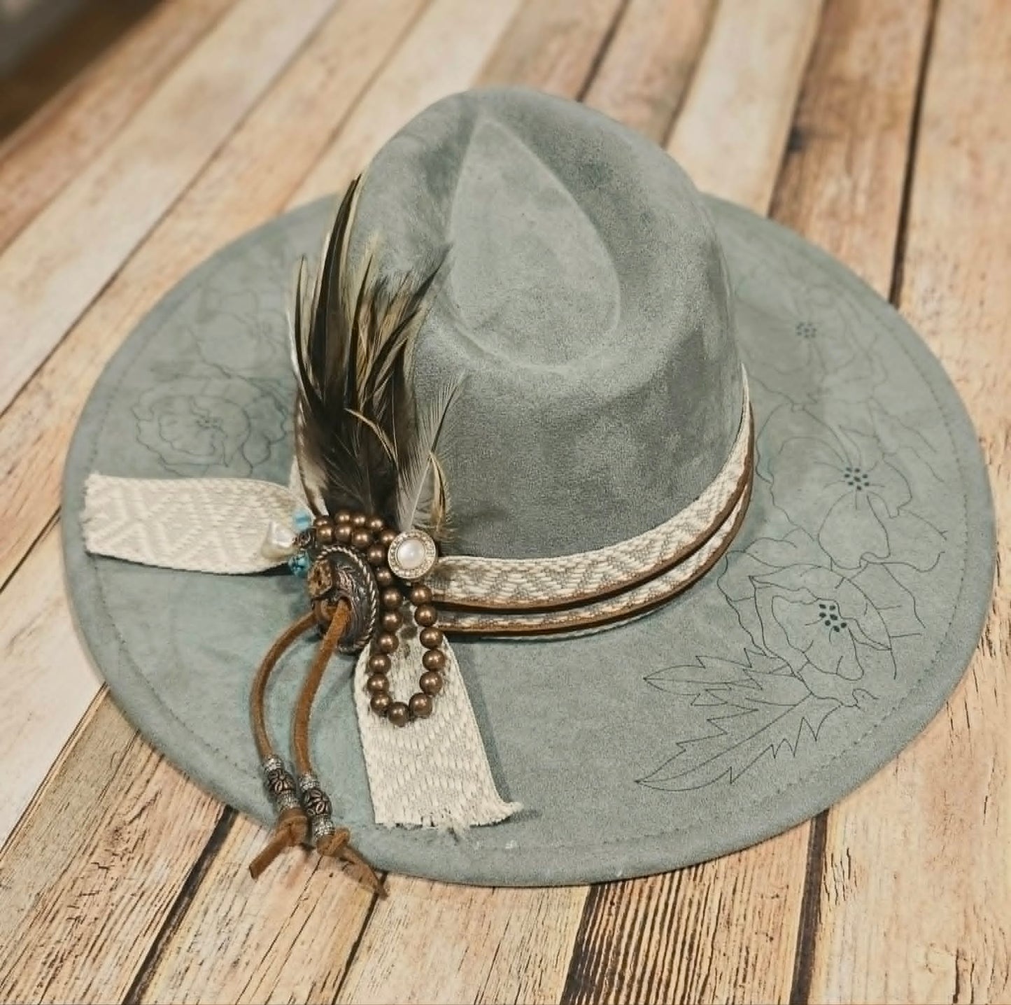 laser poppy flower large brim hat, feather hat, teal large brim hat, bead and feather embellished hat, cowboy hat, laser floral design cowboy hat,  