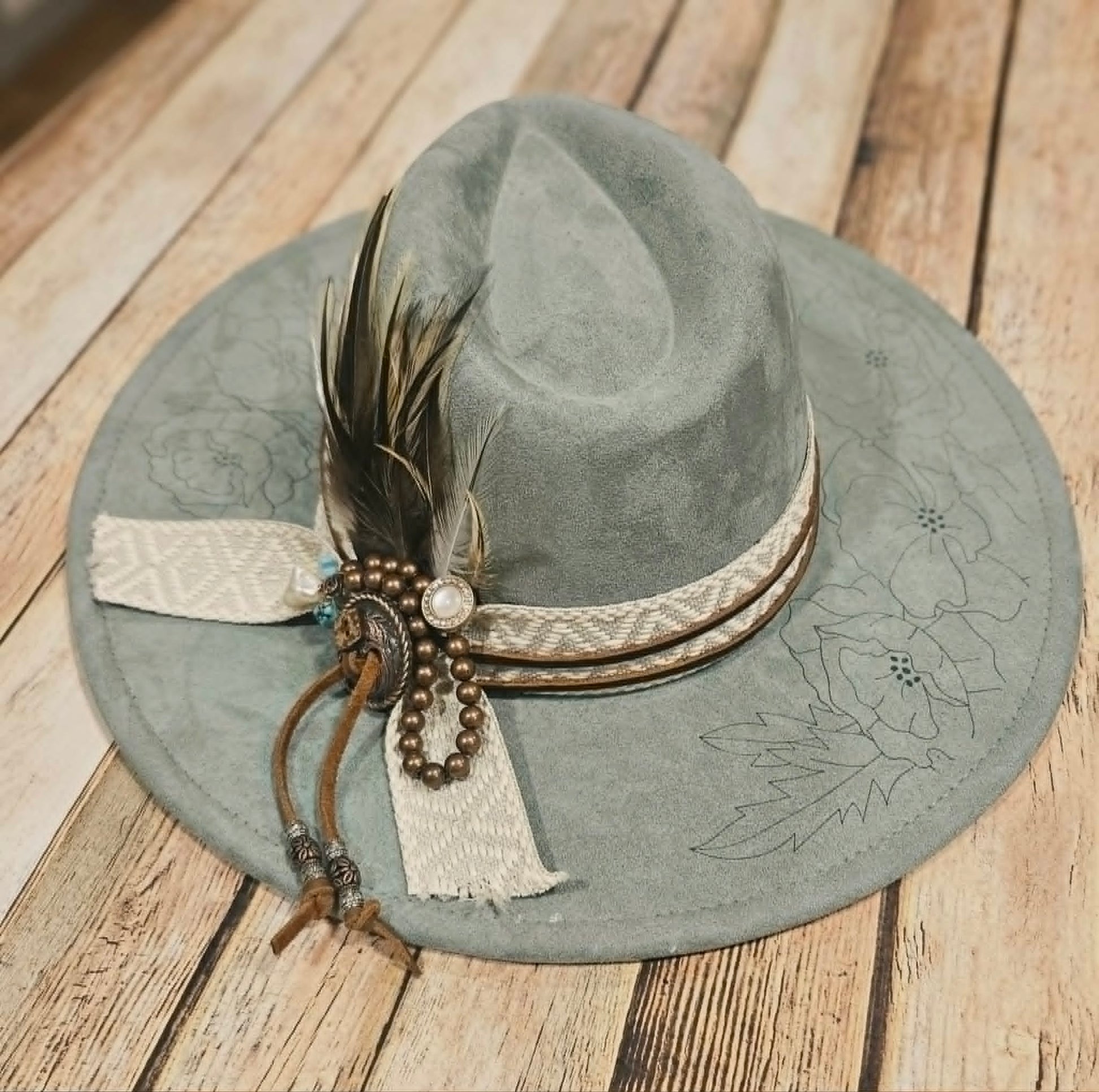 laser poppy flower large brim hat, feather hat, teal large brim hat, bead and feather embellished hat, cowboy hat, laser floral design cowboy hat,  