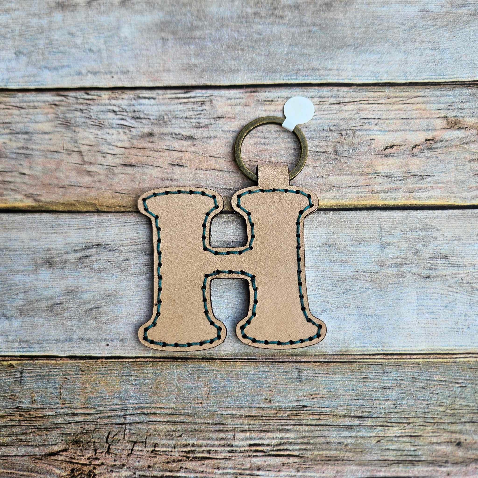 Laser burn, letter keychain, leather keychain, leather,