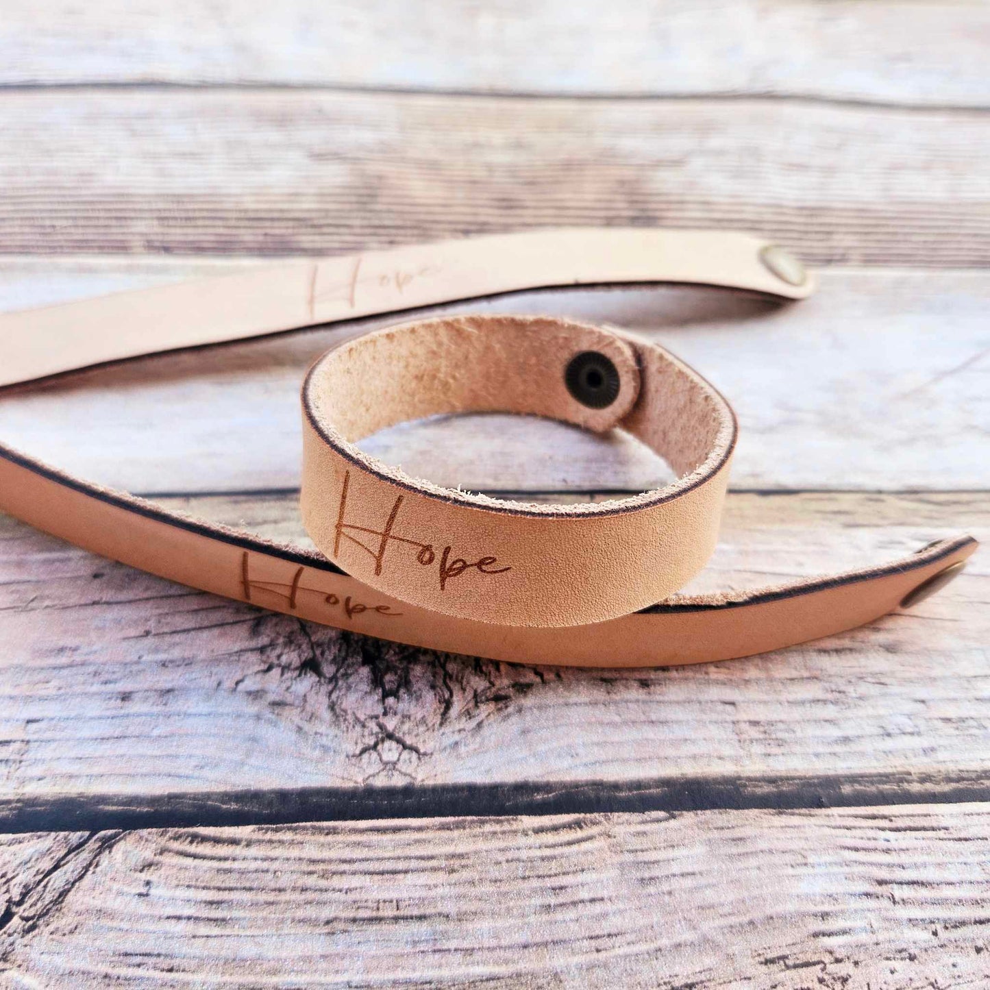 laser leather quote bracelet, strong bracelet, leather snap bracelet, burned leather