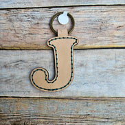 Laser burn, letter keychain, leather keychain, leather,