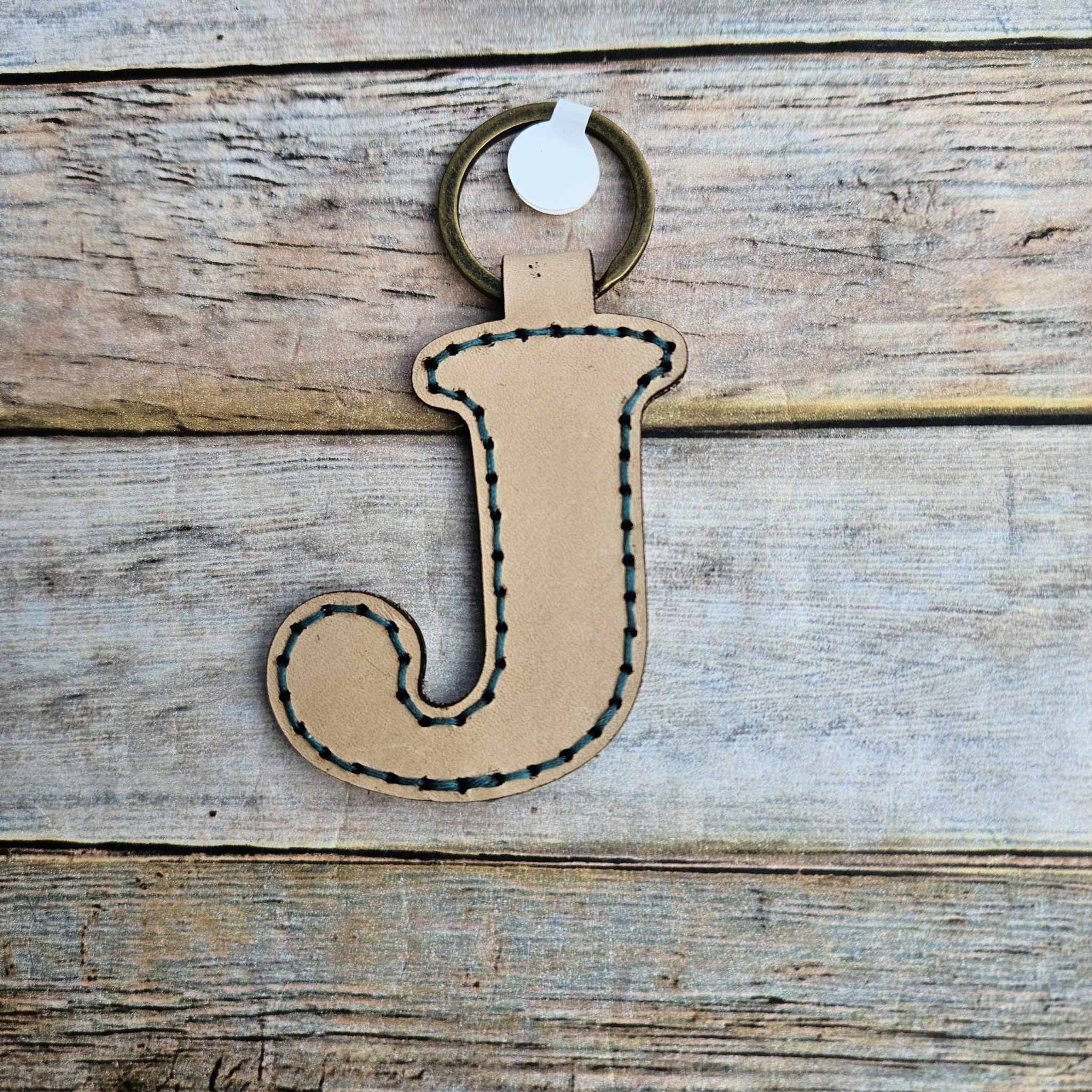 Laser burn, letter keychain, leather keychain, leather,