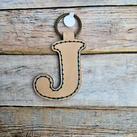 Laser burn, letter keychain, leather keychain, leather,