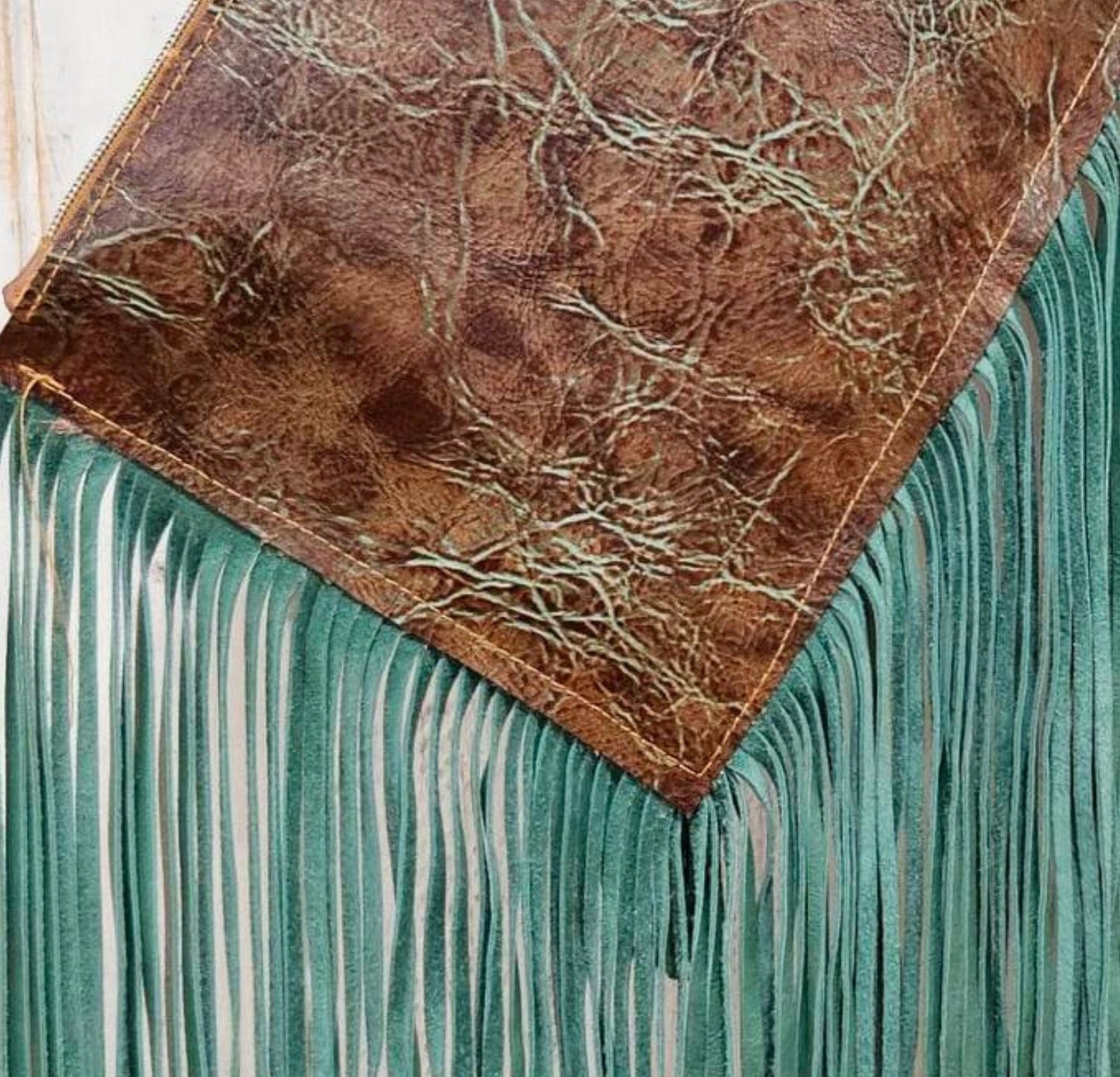 wristlet with leather fringe, leather wristlet, leather fringe wristlet, fringe wristlet, brown and turquoise leather wristlet