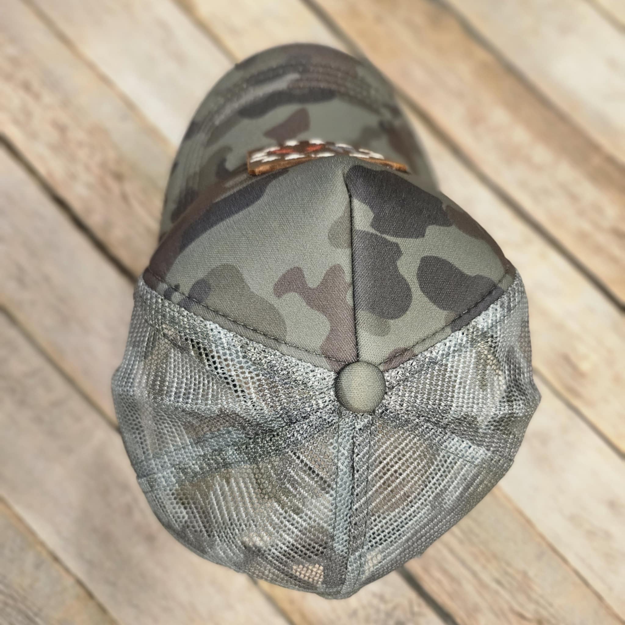 Embroidered Leather Gun Patch Trucker Hat