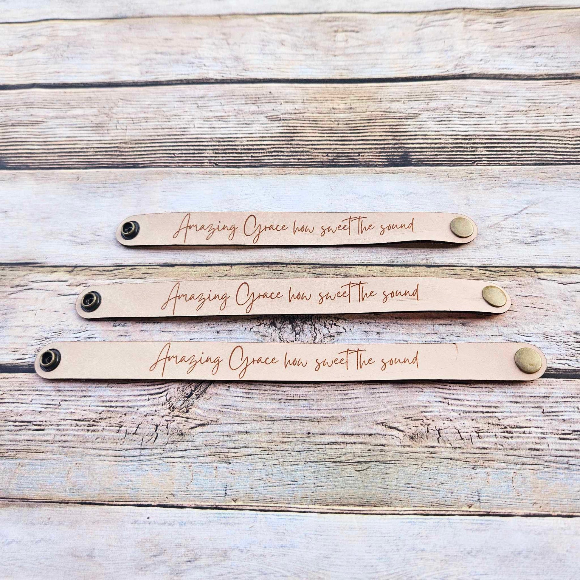 laser leather quote bracelet, strong bracelet, leather snap bracelet, burned leather