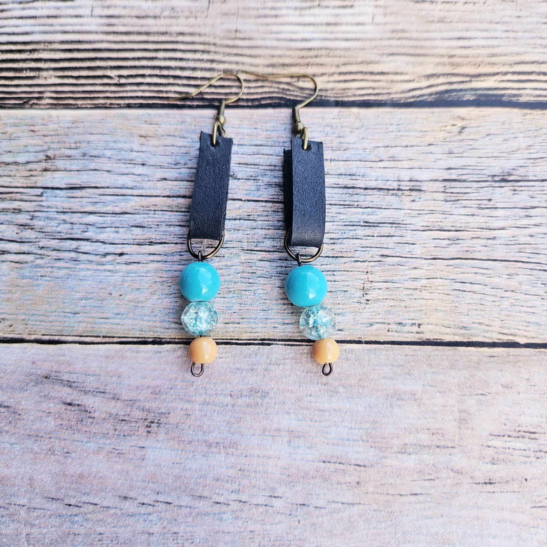 antique gold, black leather, turquoise beads, handmade earrings  