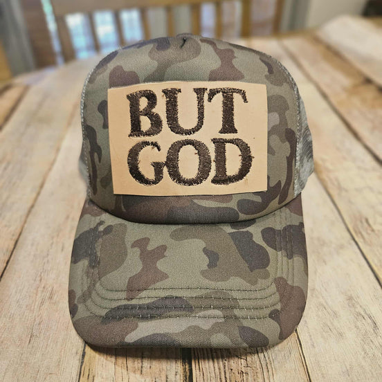 camo trucker cap with "But God" leather embroidered patch 