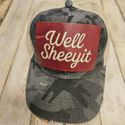 Camouflage baseball cap with a red patch embroidered with 
