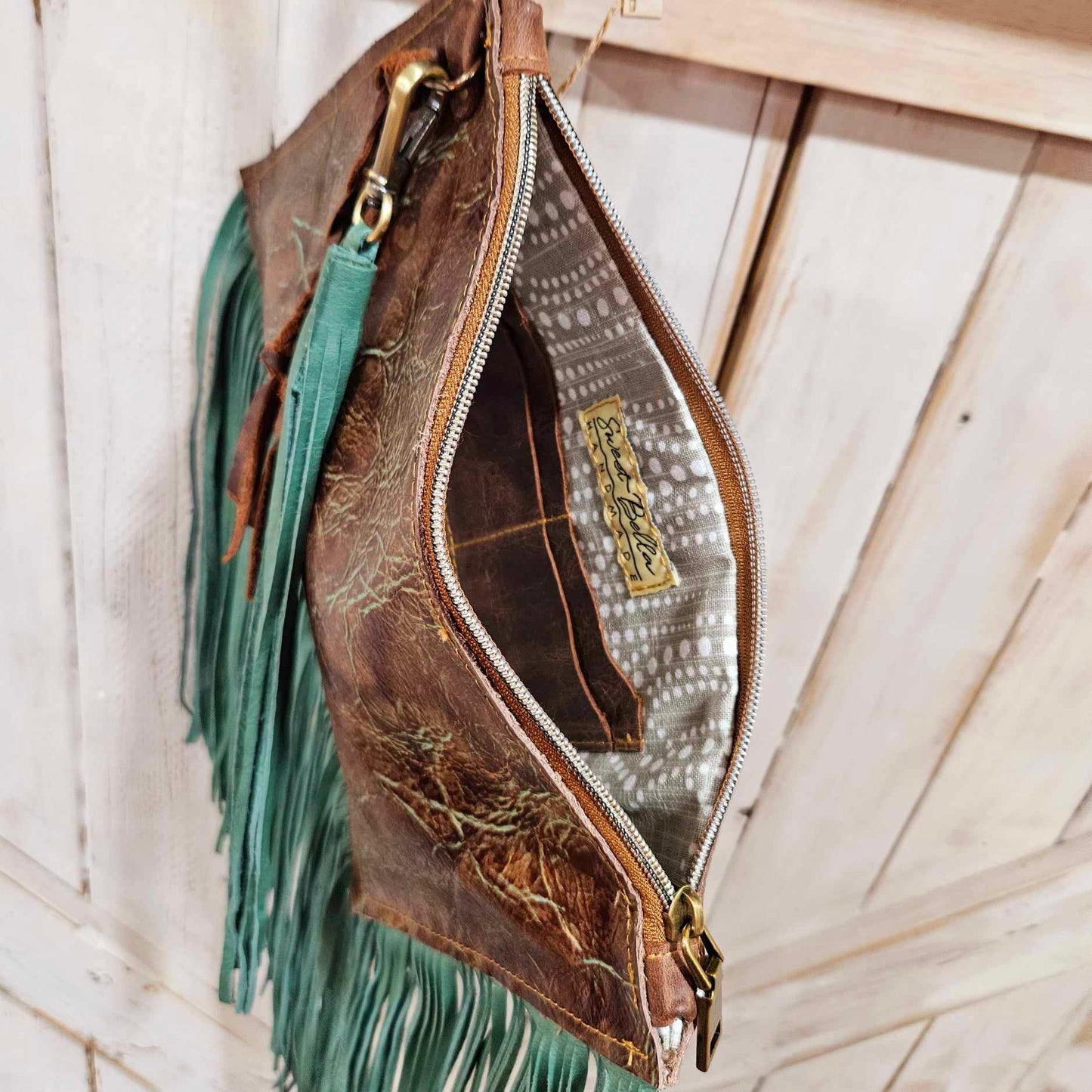 wristlet with leather fringe, leather wristlet, leather fringe wristlet, fringe wristlet, brown and turquoise leather wristlet