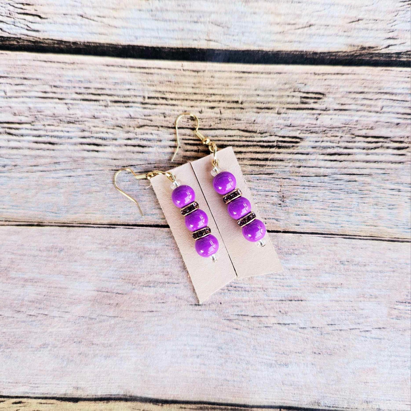 gold earrings, purple rhinestone and beaded earrings, vegetable tan leather jewelry, handmade jewelry 