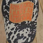 black and white cow print crisscross cap, crisscross ponytail cap, apparently, I have an attitude leather embroidered patch cap, coral embroidered leather patch cap 