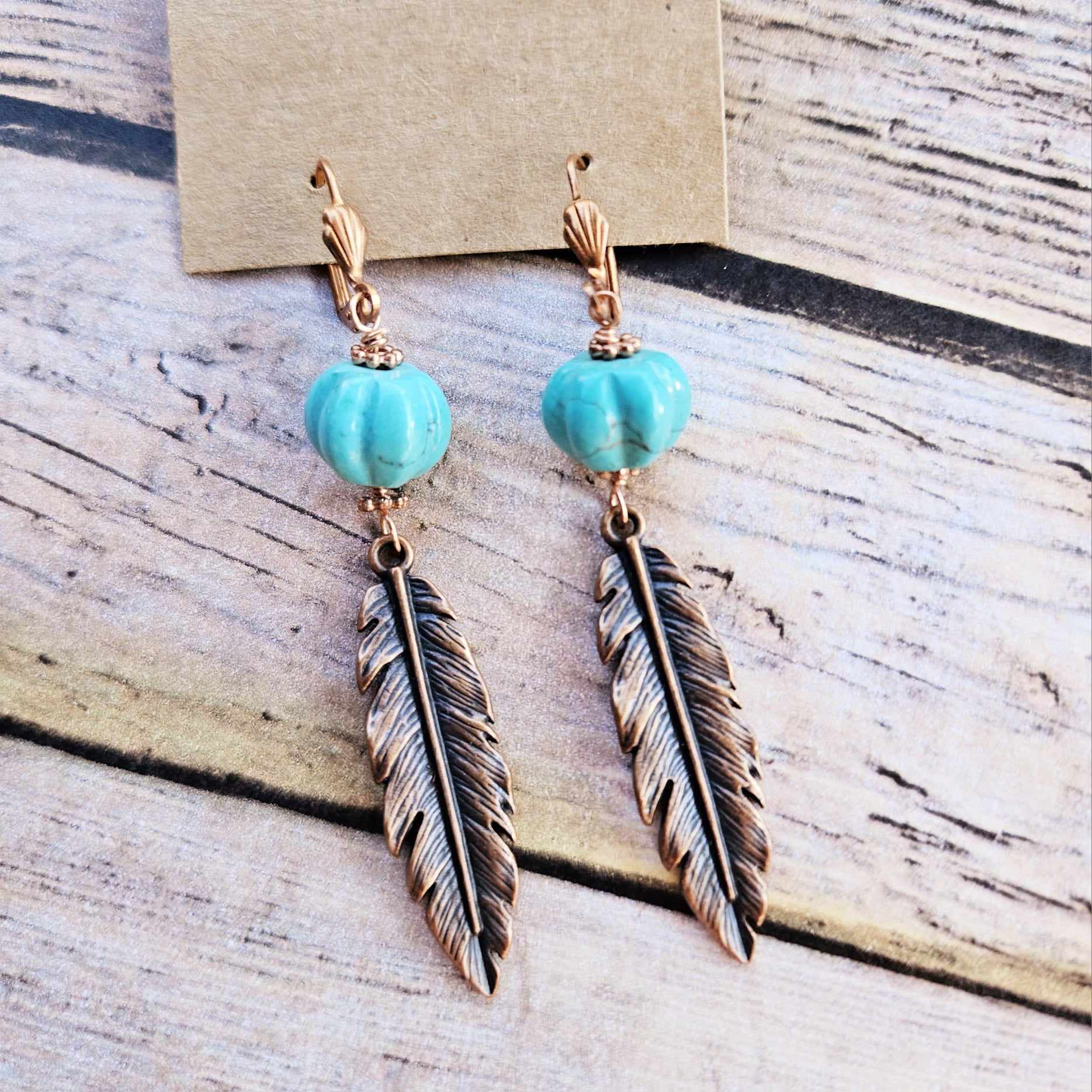 ewelry  southwest jewelry  western jewelry  beaded jewelry  vintage jewelry  handmade jewelry  handmade leather jewelry  leather jewelry  feather jewelry  antique copper feather jewelry  copper feather jewelry  Copper earrings  copper feather earrings